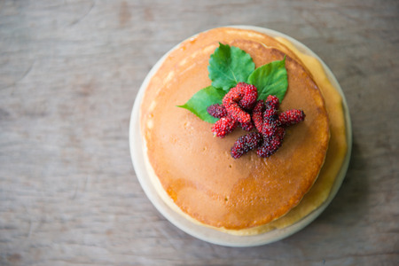 Delicious pancakes with fresh mulberry and honey, dessertの写真素材