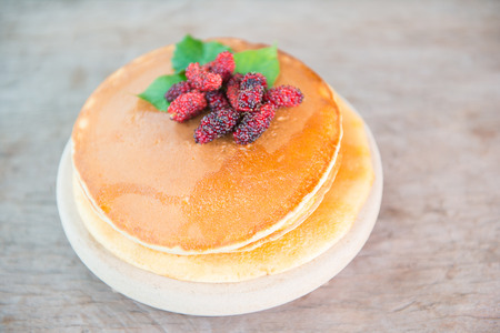 Delicious pancakes with fresh mulberry and honey, dessertの写真素材