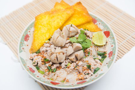 white noodles with meatballs and fried wonton, foodの写真素材