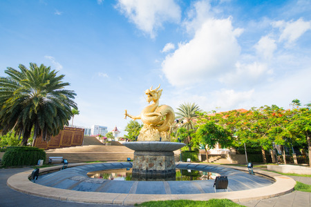 gold statue dragon in Phuket town, courtyardの写真素材