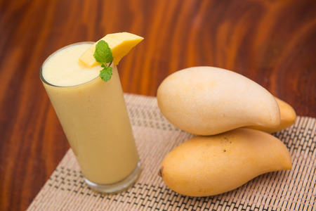 mango smoothie with mangoes, fruitの写真素材