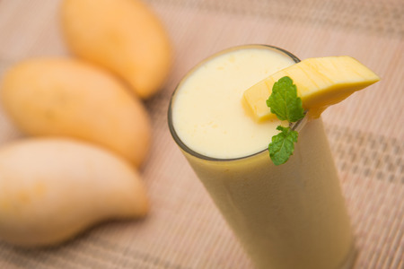 mango smoothie with mangoes, fruitの写真素材