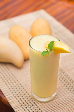 mango smoothie with mangoes, fruitの写真素材