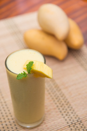 mango smoothie with mangoes, fruitの写真素材