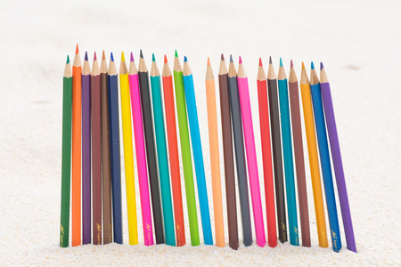crayon wood color on the beach, stationeryの写真素材