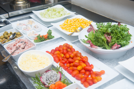 fresh vegetable in salad line , cookの写真素材