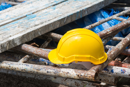 yellow hard hat in Construction Site, workerの写真素材