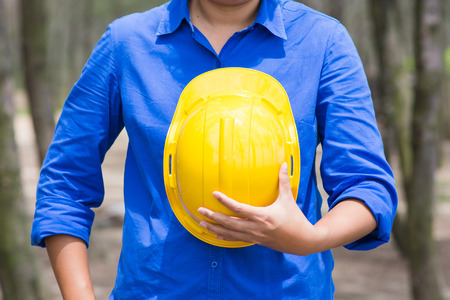 yellow hard hat in Construction Site, workerの写真素材