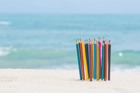 crayon wood color on the beach, stationeryの写真素材