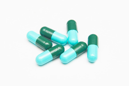 Tablets pills capsule on white background, drugの写真素材