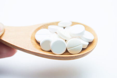 paracetamol on wooden spoon, drugの写真素材