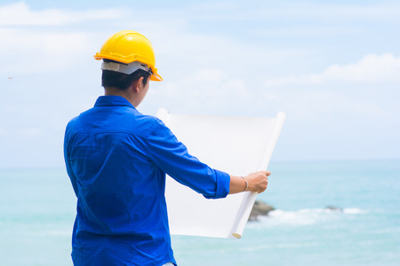 architect is looking on the plan, paperの写真素材
