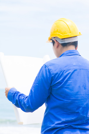 architect is looking on the plan, paperの写真素材