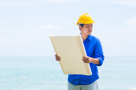 architect is looking on the plan, paperの写真素材