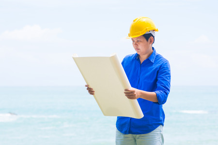 architect is looking on the plan, paperの写真素材