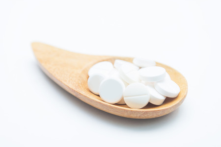 paracetamol on wooden spoon, drugの写真素材