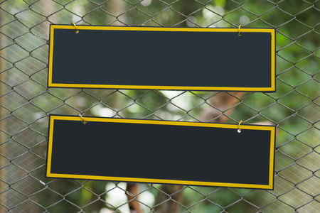 blank black label in front of cage, zooの写真素材