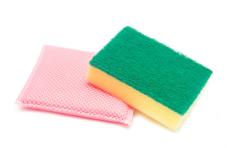 Sponges for dishwashing on white background, cleaningの写真素材