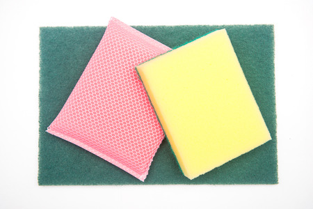 Sponges for dishwashing on white background, cleaningの写真素材