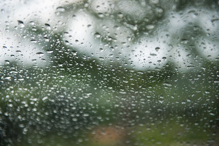 Drop of water from rain on glass, wetの写真素材