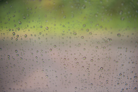 Drop of water from rain on glass, wetの写真素材