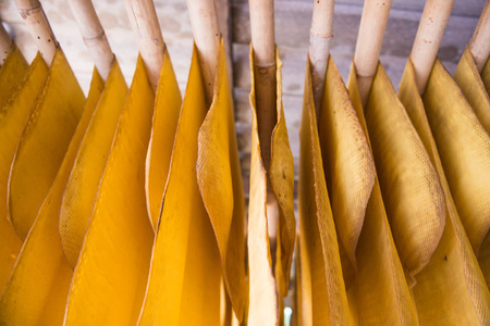 The rubber sheet are hanged on the bamboo hanger, rawの写真素材