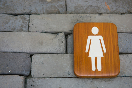Female toilet signs wood on the wall, labelの写真素材