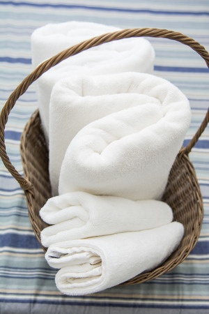 white towel in basket, bathroomの写真素材