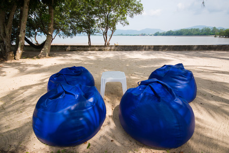 comfortable blue seats near the sea, natureの写真素材