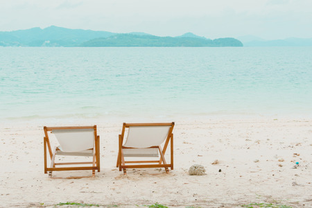 beach chair on the beach at Naka Noi Island, Phuket Thailandの写真素材