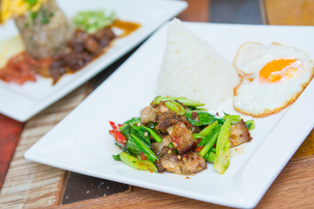 Kale with crispy pork and rice, foodの写真素材