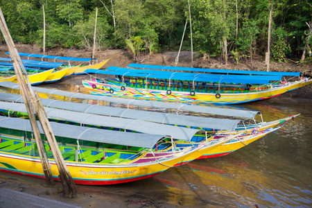colorful long tail boat in the river, outdoorの写真素材