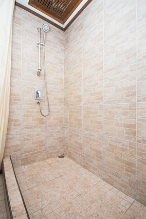 Bathing area in the bathroom with a shower, interiorの写真素材