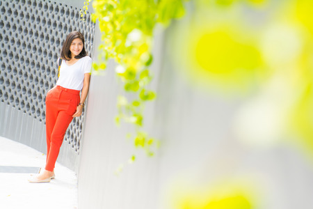 portrait of woman smiling happy in garden, outdoorの写真素材