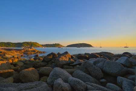 beautiful sunset at Nai Harn Beach, Phuket Thailandの写真素材