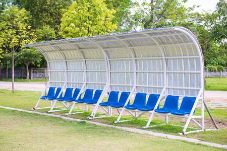 seats for coaches and athletes on the football field, outdoorの写真素材