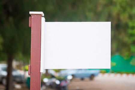 white wooden sign board on nature background, blankの写真素材