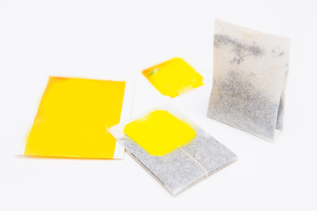tea bag with yellow label, の写真素材