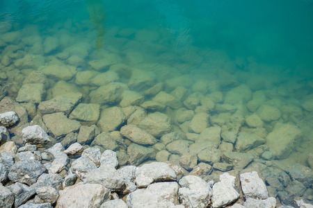 stone in water at dam, natureの写真素材