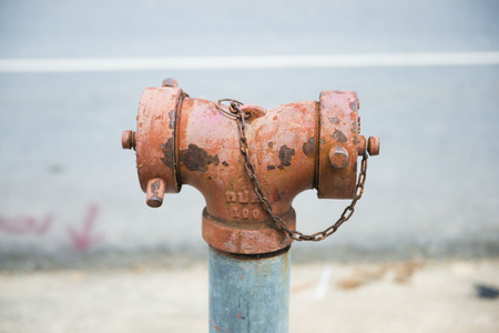 old fire hose on floor, equipmentの写真素材