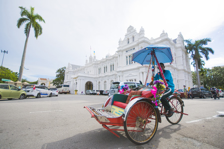 Penang, Malaysia - August 10-2015 :: three-wheeler in front of Penang State Museum & Art Gallery in George Town Malaysiaのeditorial素材