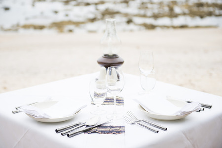 set up for dinner on the beach, dinnerの写真素材