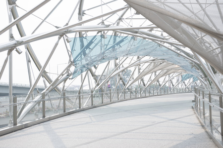 MARINA BAY, SINGAPORE- OCTOBER 13, 2015: The Helix Bridge in day path to Marina Bay Sand, Singaporeのeditorial素材