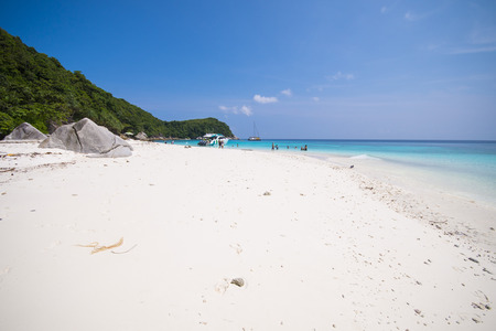 beautiful tropical beach with calm blue sea surf, Racha Noi Island, Phuket, Thailand
