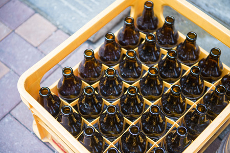 beer bottle in yellow plastic crates, glassの写真素材
