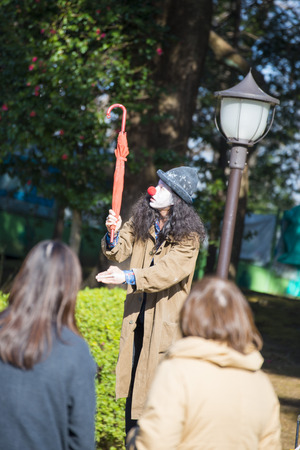 UENO, JAPAN - FEBRUARY 19, 2016 : magic show at Ueno park, the show open with a hatのeditorial素材