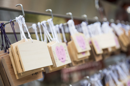 TOKYO, JAPAN, FEBRUARY 23, 2016 : wooden prayer tablets for pray good life in a buddhist temple,...