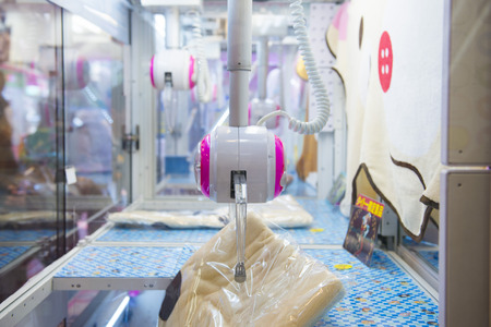 Ameyoko - Japan 18 February 2016 :: catch dolls crane game machine in Ameyoko Marketのeditorial素材