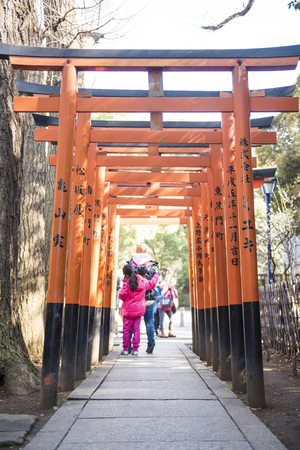 UENO, JAPAN - FEBRUARY 19, 2016 : Torii doors tunnel gate to Gojo Tenjin shrine at Ueno park, templeのeditorial素材