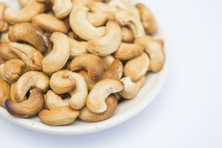 roasted cashews nut on dish, foodの写真素材